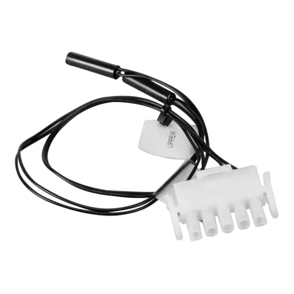 A white plastic object with a black and white cable and white connectors.