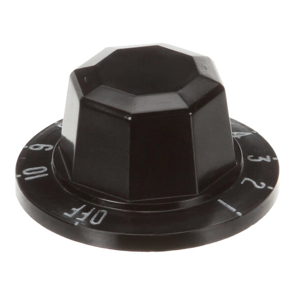 A black plastic Vulcan thermostat knob with numbers on it.