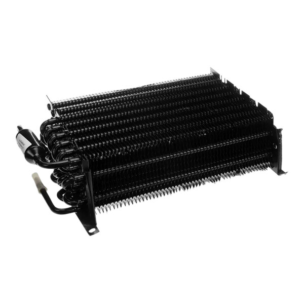 A black metal Turbo Air Refrigeration evaporator coil with many small spirals.