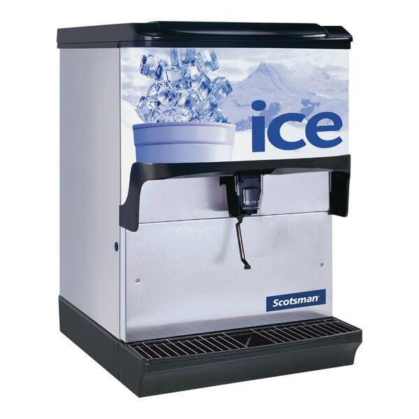 A Scotsman countertop ice dispenser with ice cubes.