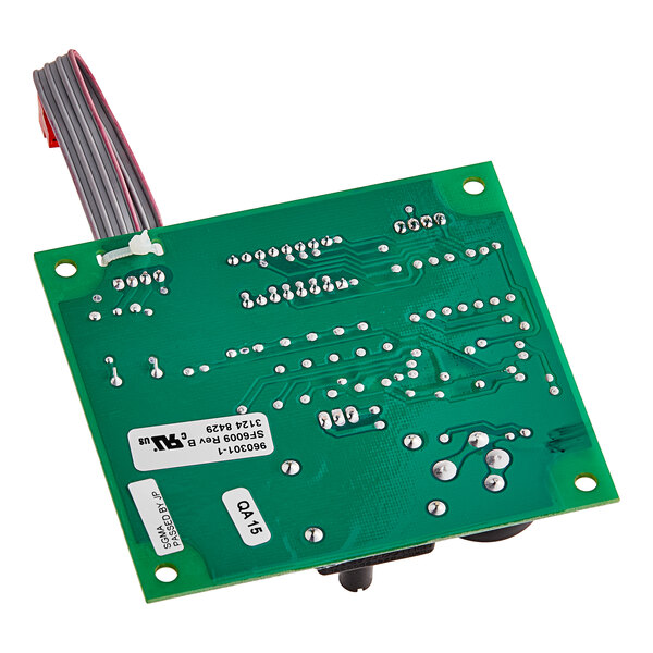 A green Vulcan timer board circuit with wires.