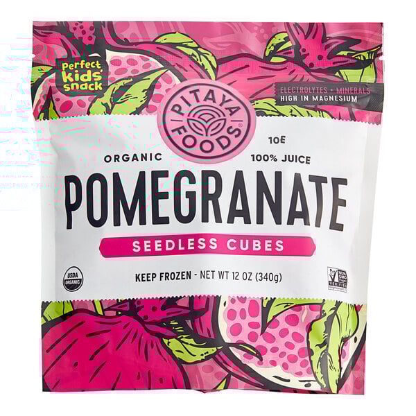 A bag of Pitaya Foods organic seedless pomegranate cubes on a white surface.