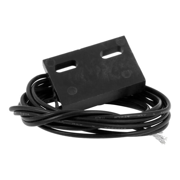 A black cable wrapped around a black rectangular object with a black plastic connector.
