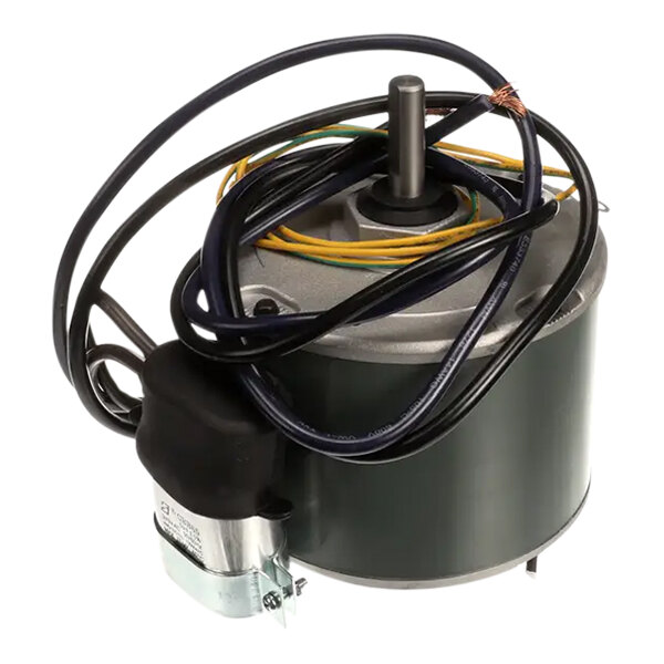 An Ice-O-Matic motor fan with wires and a wire harness.