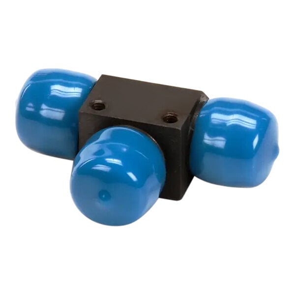 A black and blue object with three blue knobs on a white surface.