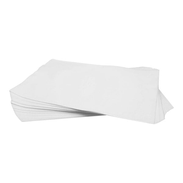 A stack of white folded papers.