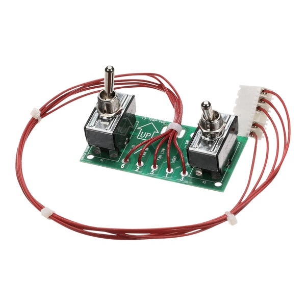 A green Vulcan switch board with red and white wires.