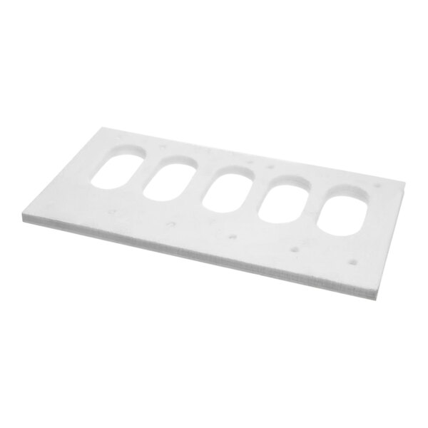 A white plastic rectangular gasket with holes.