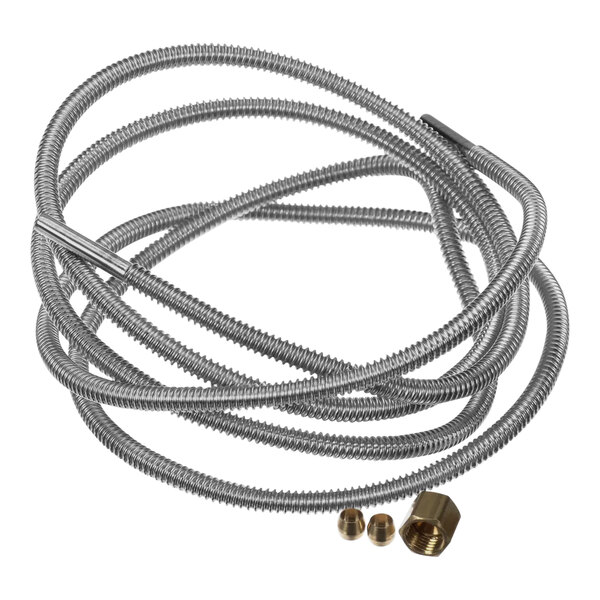 A close-up of a stainless steel flexible hose with brass connectors.