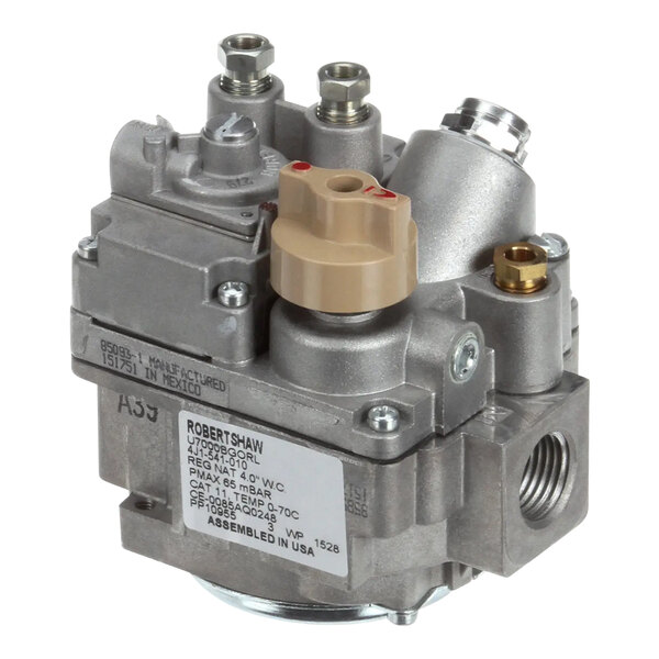 A close-up of a grey metal Pitco gas valve with a white label.