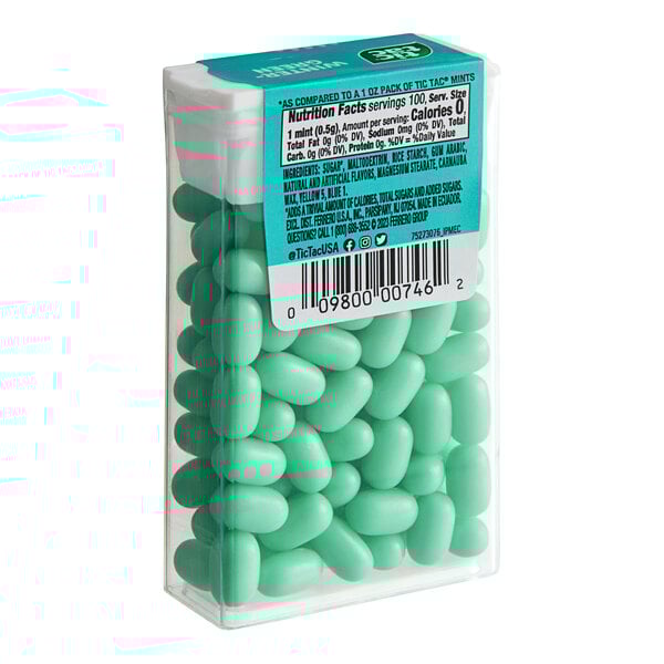 A white plastic container of TIC TAC Wintergreen mints.