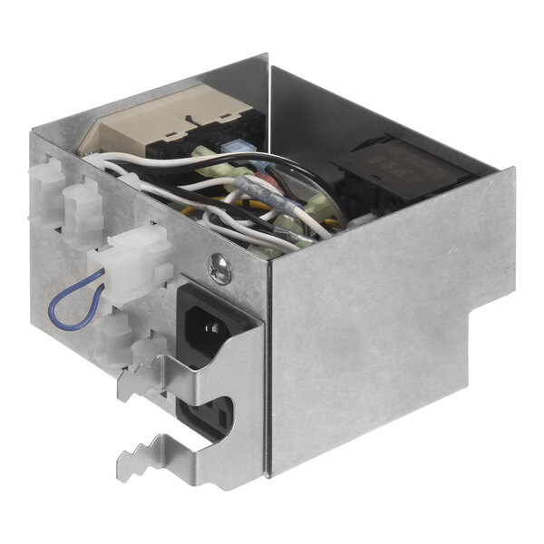 A metal box with wires and plugs.