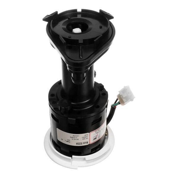 An Ice-O-Matic water pump assembly with a white base.