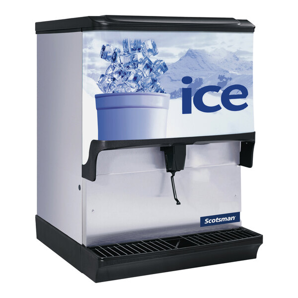 A Scotsman countertop ice dispenser with ice in a bucket.