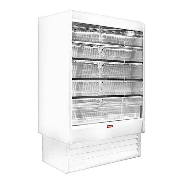 A white Howard McCray vertical open air curtain dairy merchandiser with shelves.