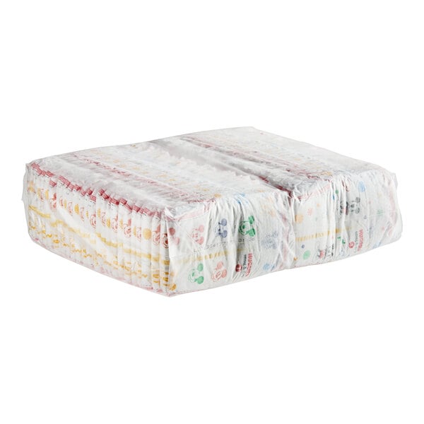 A plastic wrapped stack of Huggies Snug & Dry Size 1 baby diapers.