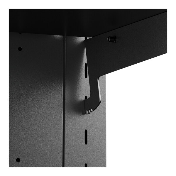 A metal shelf with a metal bracket and screw.