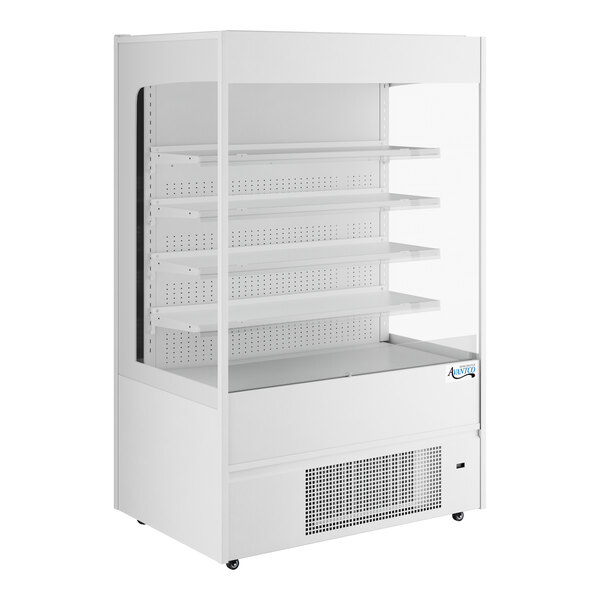 An Avantco white vertical air curtain merchandiser with shelves.