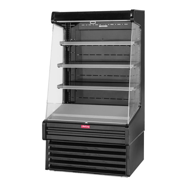 A black vertical open air curtain dairy merchandiser with clear shelves.