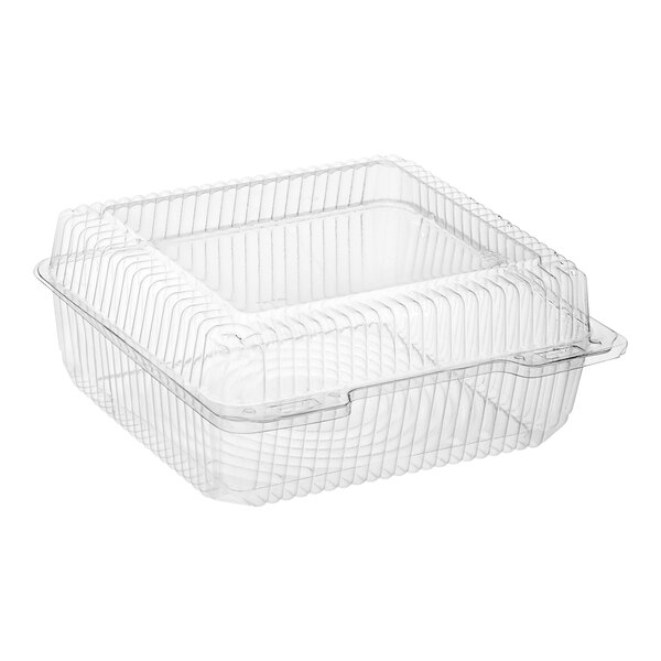A Polar Pak clear plastic rectangular hinged container with a lid.