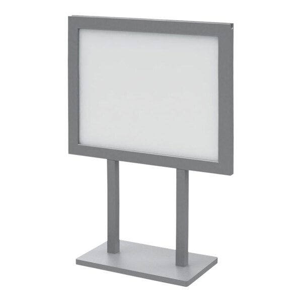 A silver metal stand with a blank white board on it.