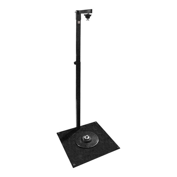 A black metal stand with a round base for a POLY TUBING, KRAFT PAPER, & STRETCH FILM DISPENSER.