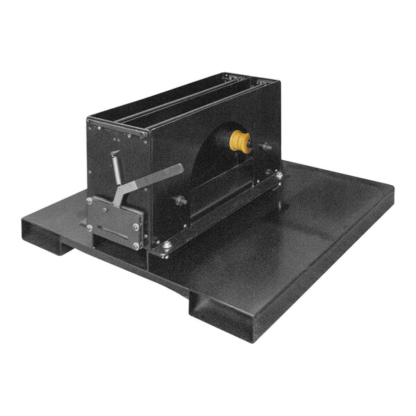 A black metal machine with a yellow handle and knob.