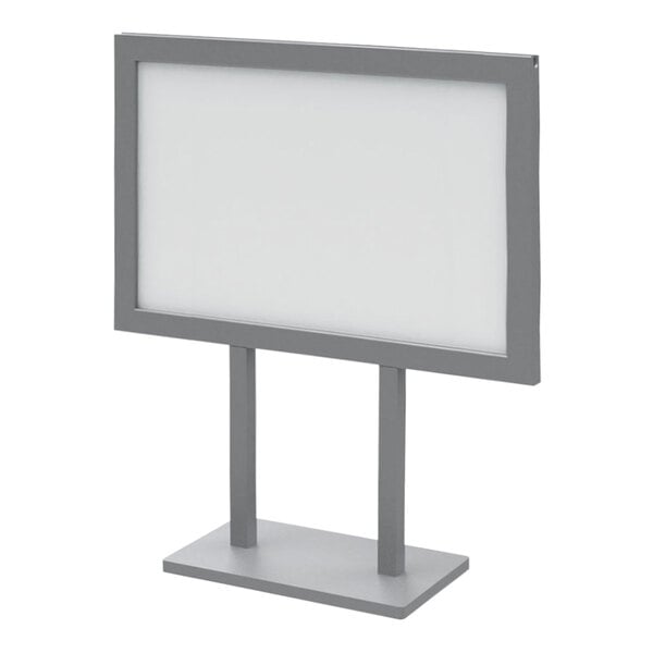 A silver metal stand with a blank white board on it.