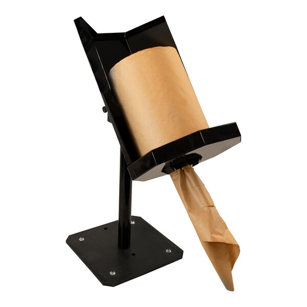 An Encore Packaging steel table-mount center pull Kraft paper dispenser with a roll of Kraft paper on it.
