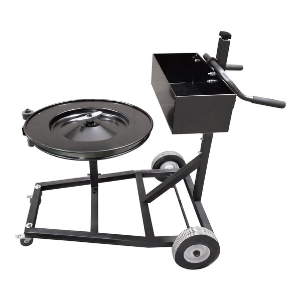 A black metal horizontal strapping dispenser cart with wheels and a black tray on top.