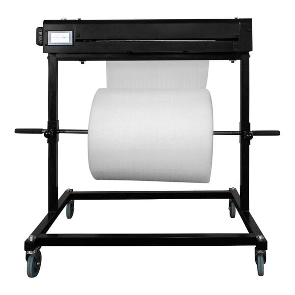 A large roll of paper on a black metal stand.