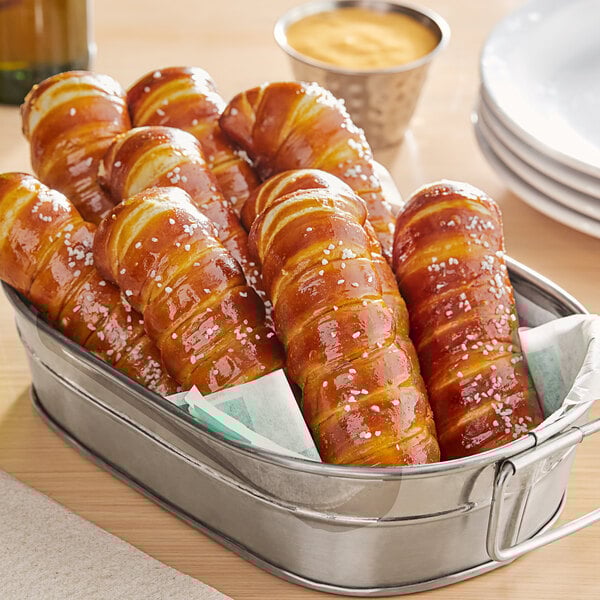 A metal bowl of Ditsch soft pretzel sticks.