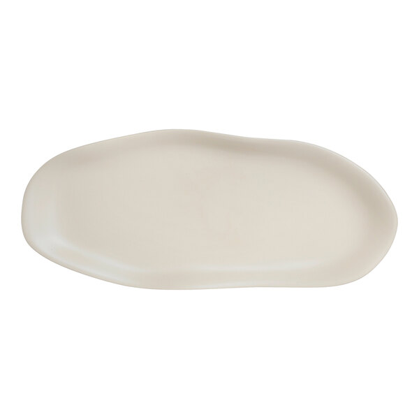 A white oval plate with a curved edge.