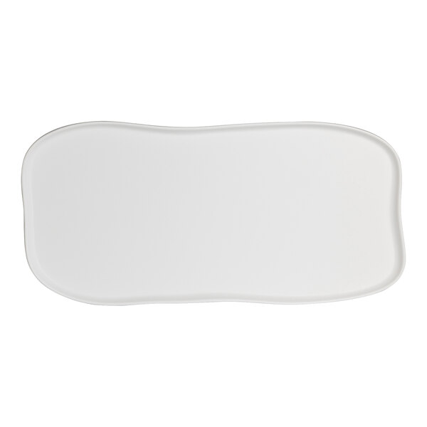 A white rectangular Delfin Marisol buffet platter with a curved edge.