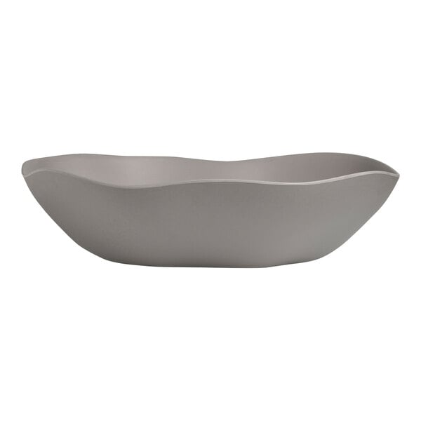 A Delfin Marisol Driftwood Gray melamine bowl with a curved edge.
