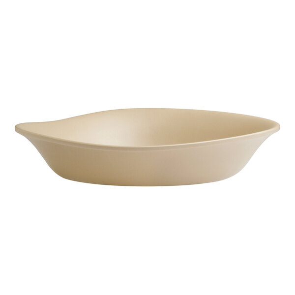 A beige Delfin Marisol melamine pasta bowl with a starfish design on the curved edge.