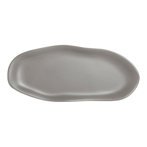 A close-up of a Delfin Marisol Driftwood Gray oval melamine slider tray with a curved edge.