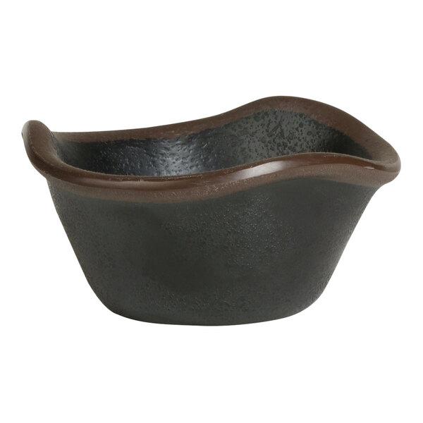 A black melamine bowl with brown edge.