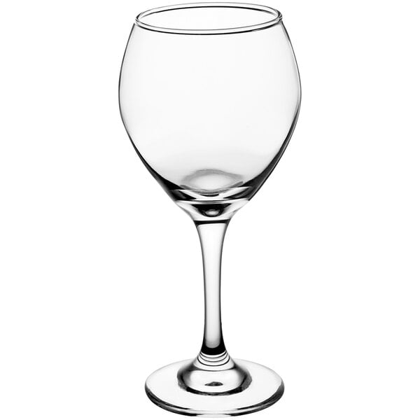 A close-up of a clear Acopa wine glass with a stem.