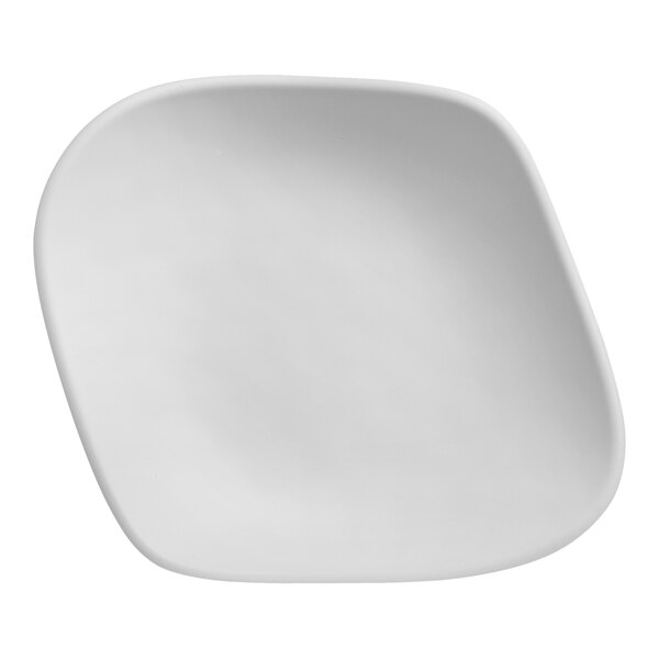 A white melamine serving bowl with a rounded edge.