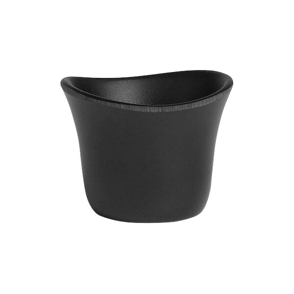 A black Delfin Marisol sauce dish with a curved edge.