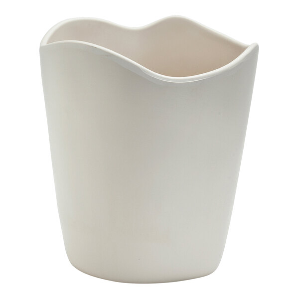 A white plastic container with a curved edge.