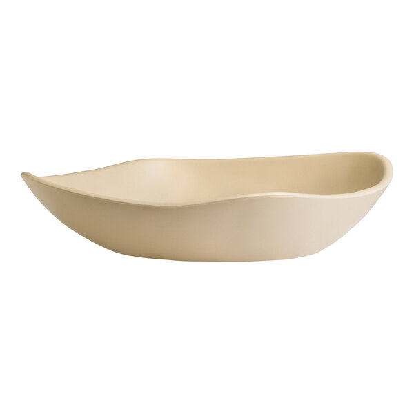 A close-up of a white Delfin Marisol small serving bowl with a curved edge.
