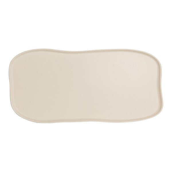 A white rectangular tray with a curved edge.