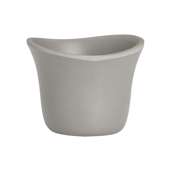 A Delfin Marisol Driftwood Gray melamine sauce dish.