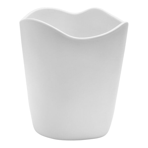 A white melamine dressing crock with a curved edge.