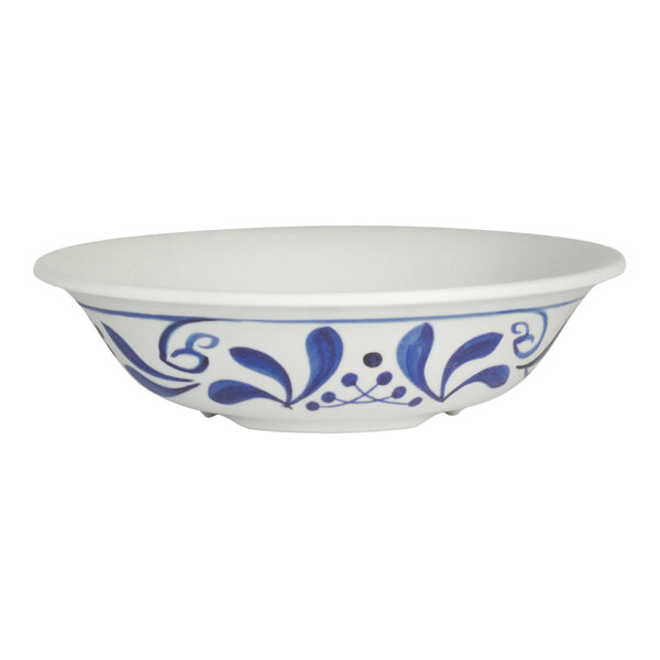 A white Delfin Viva melamine bowl with blue designs.