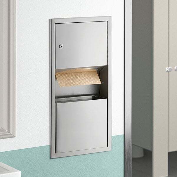 A Lavex stainless steel paper towel dispenser with waste receptacle on a wall.