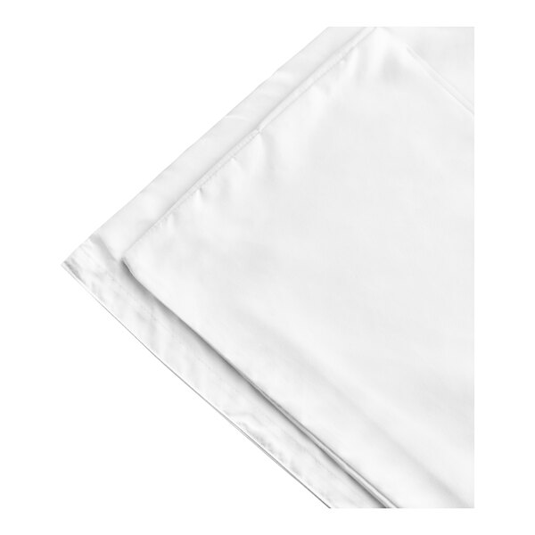 A white cloth folded on a white surface.