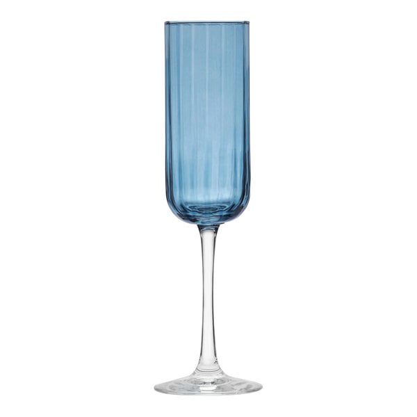 A Libbey blue flute glass with a stem.